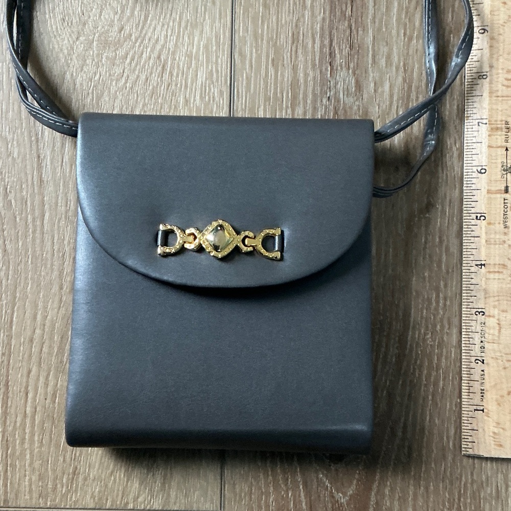 NWT, Elegant Grey Faux Leather Crossbody Bag with gold tone accent
